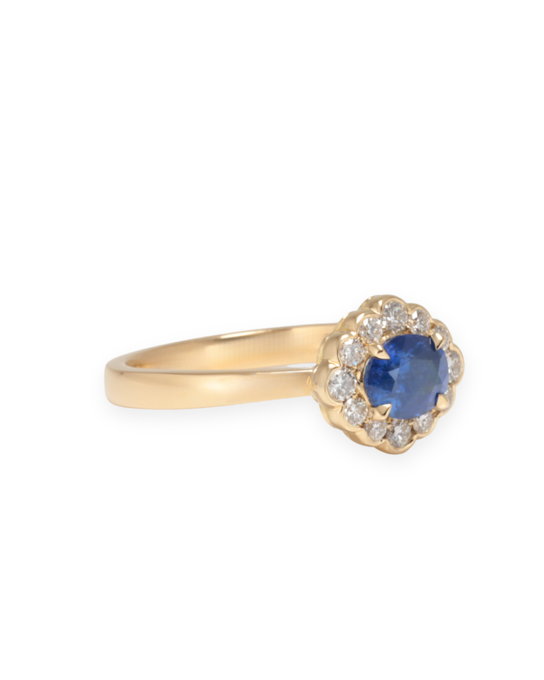 Blue Sapphire Ring with Diamonds set in Yellow Gold