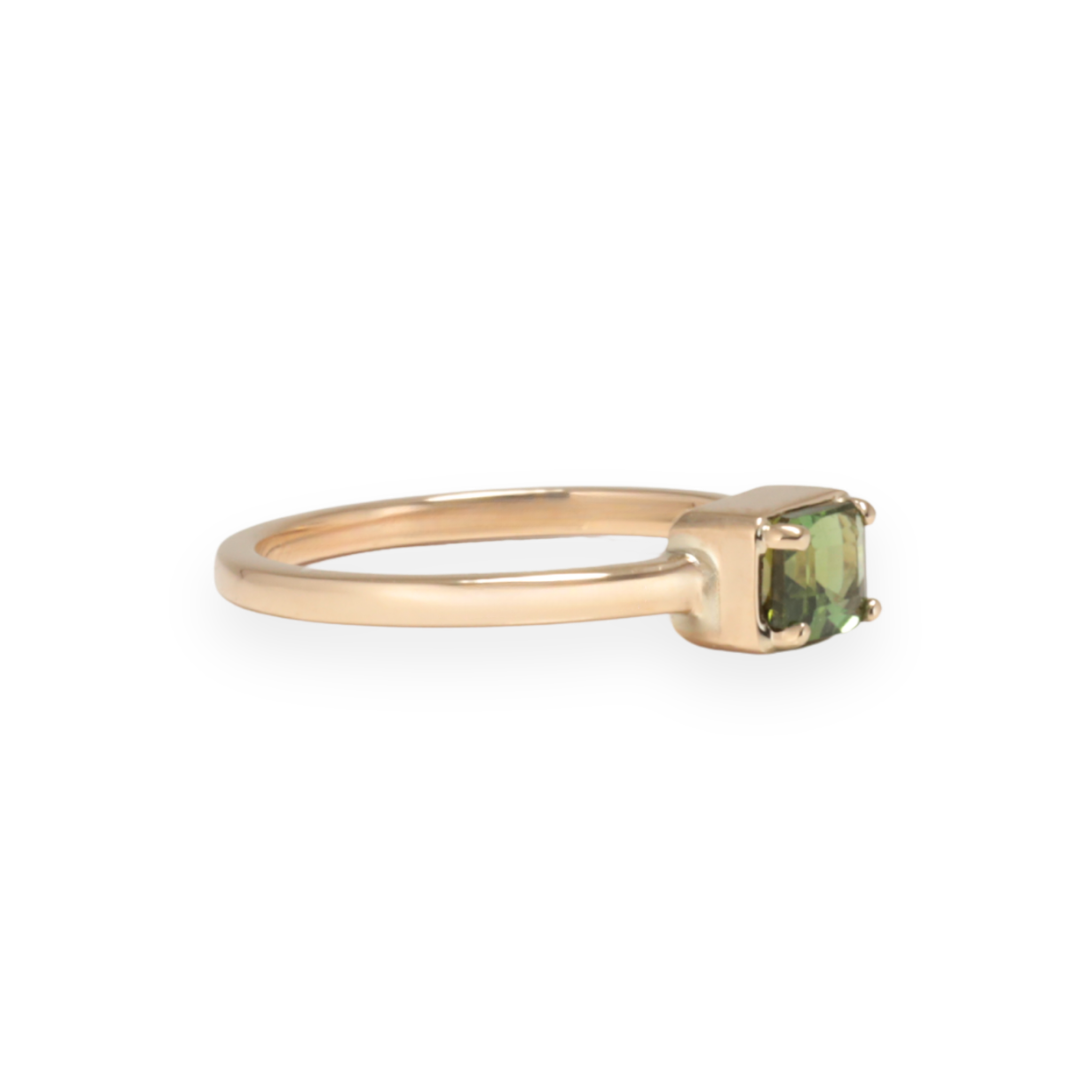 Gold ring with a green tourmaline gemstone on a white background Zappacosta Jewels
