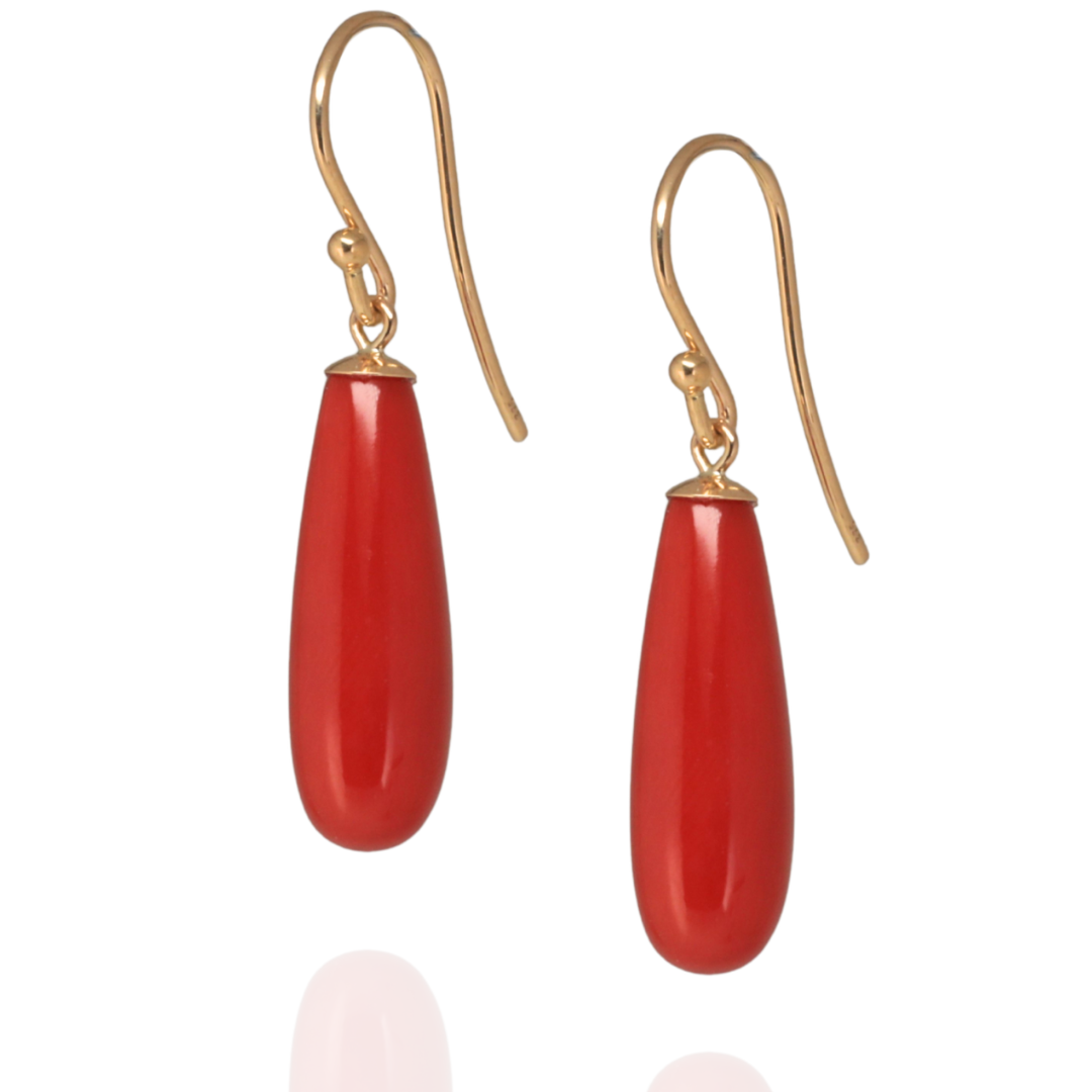 Mediterranean Red coral earrings suspended from yellow gold hooks on a white background
