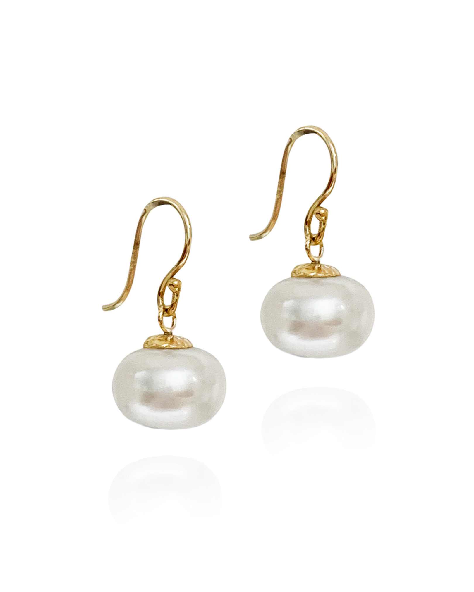 A pair of natural freshwater pearl earrings with 9ct solid yellow gold shepherds hooks. Handmade in the heart of Sydney by Zappacosta Jewels 