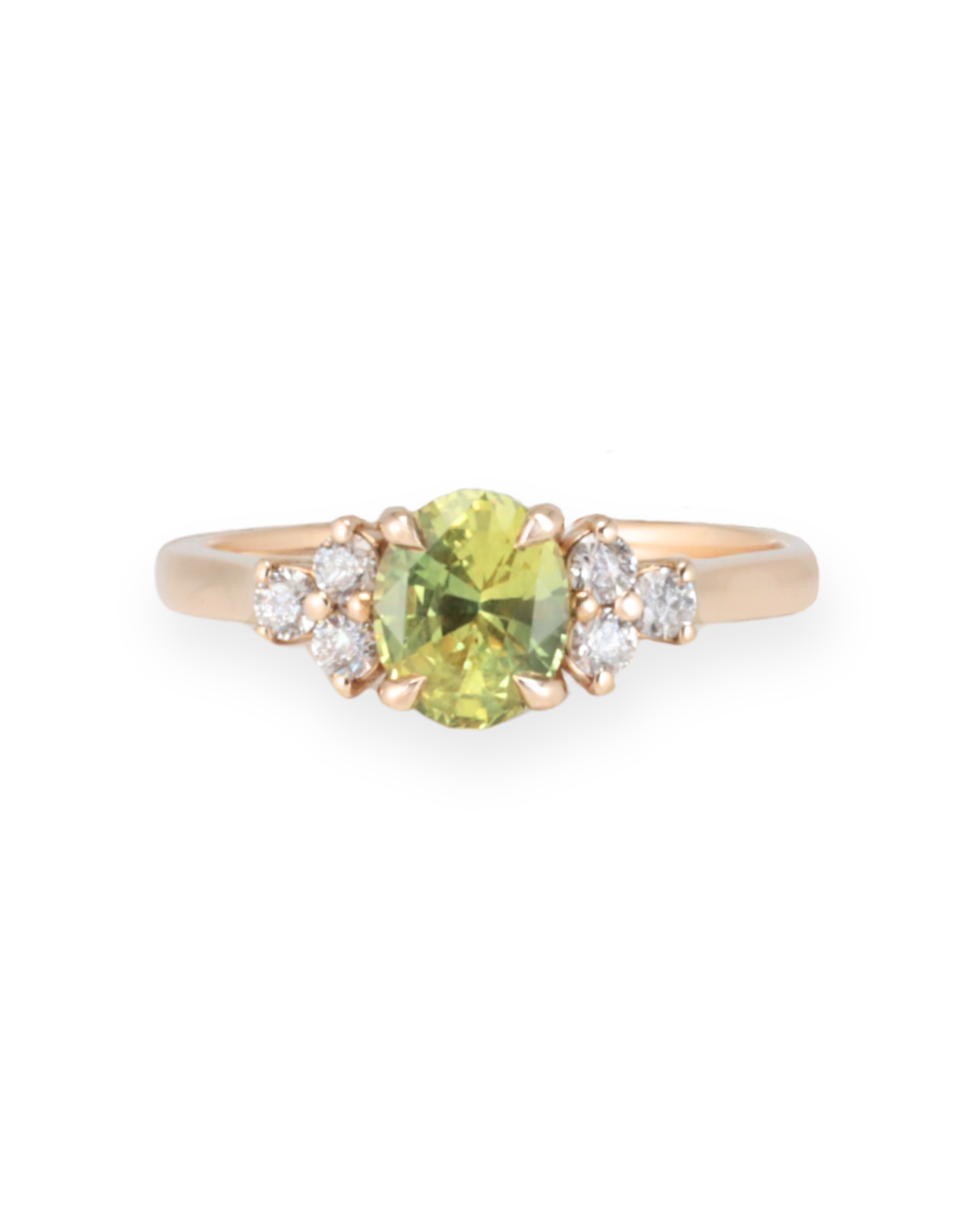 Gold ring with a natural sapphire gemstone and smaller diamonds on a white background Zappacosta Jewels