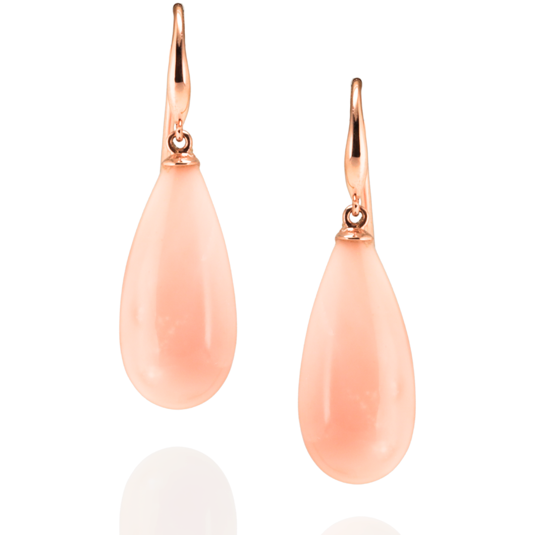 Pair of pink pacific coral earrings suspended in rose gold hooks