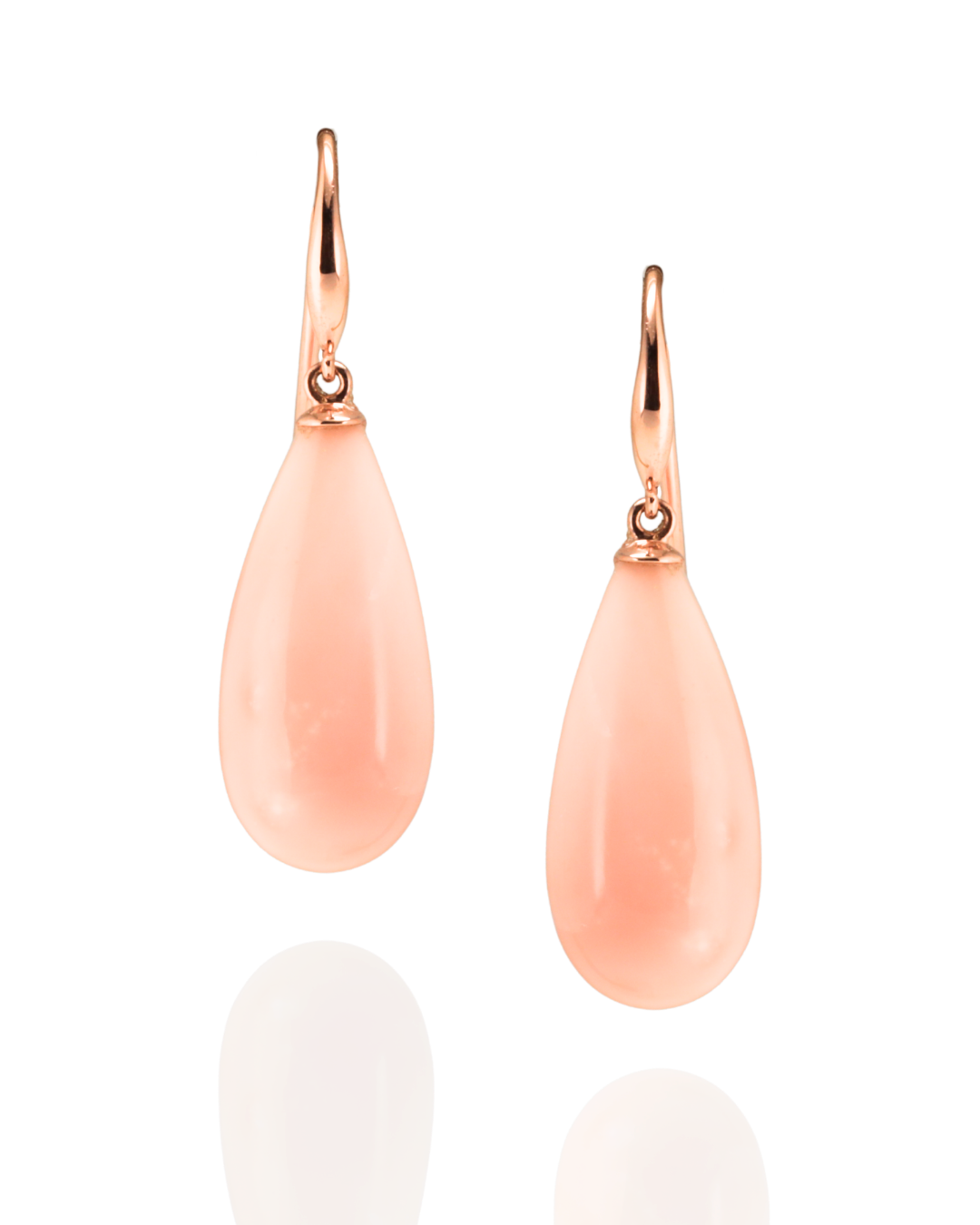Pair of pink pacific coral earrings suspended in rose gold hooks