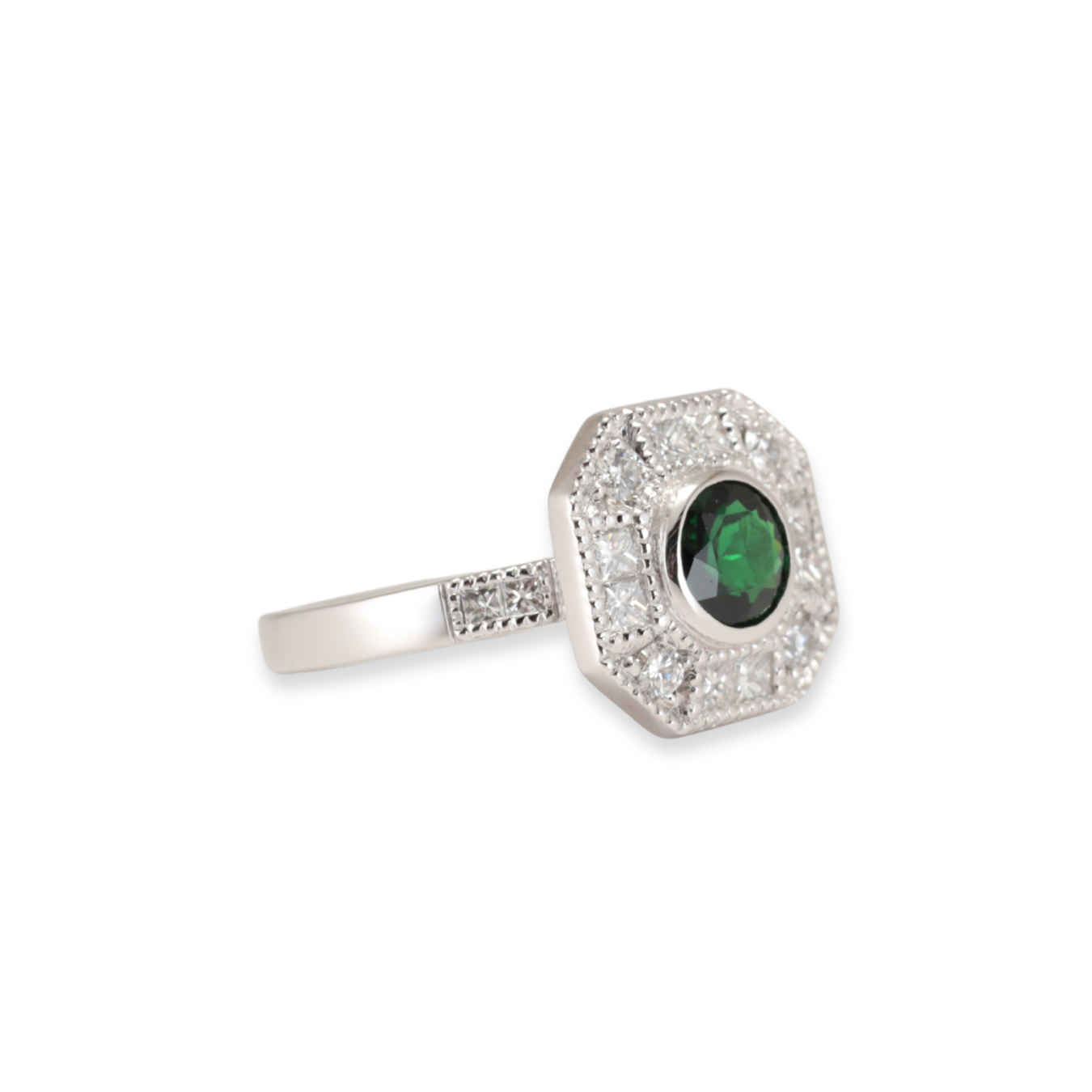 Platinum Tsavorite Garnet ring set with natural Diamonds, with Diamonds set in the band