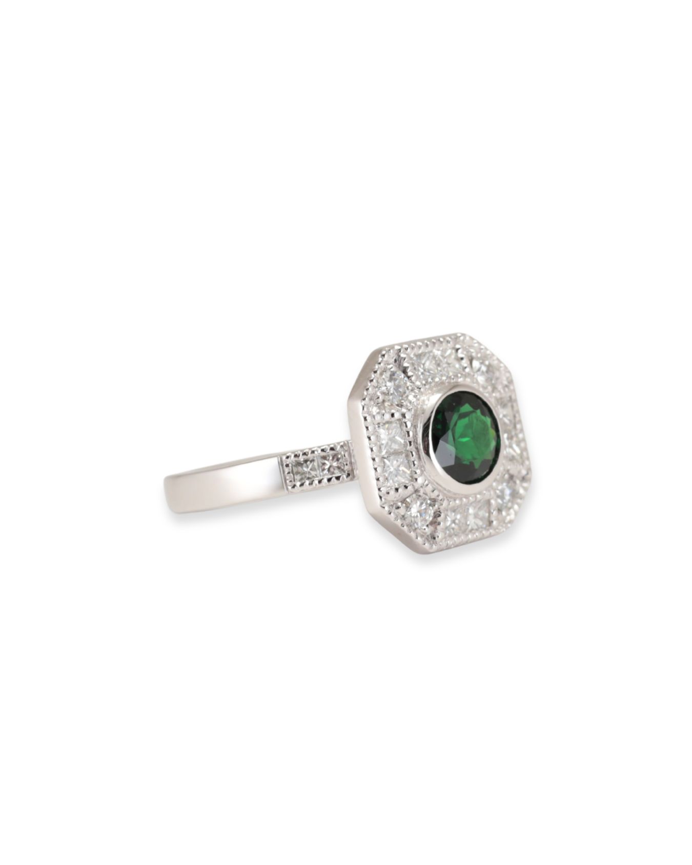 Platinum Tsavorite Garnet ring set with natural Diamonds, with Diamonds set in the band