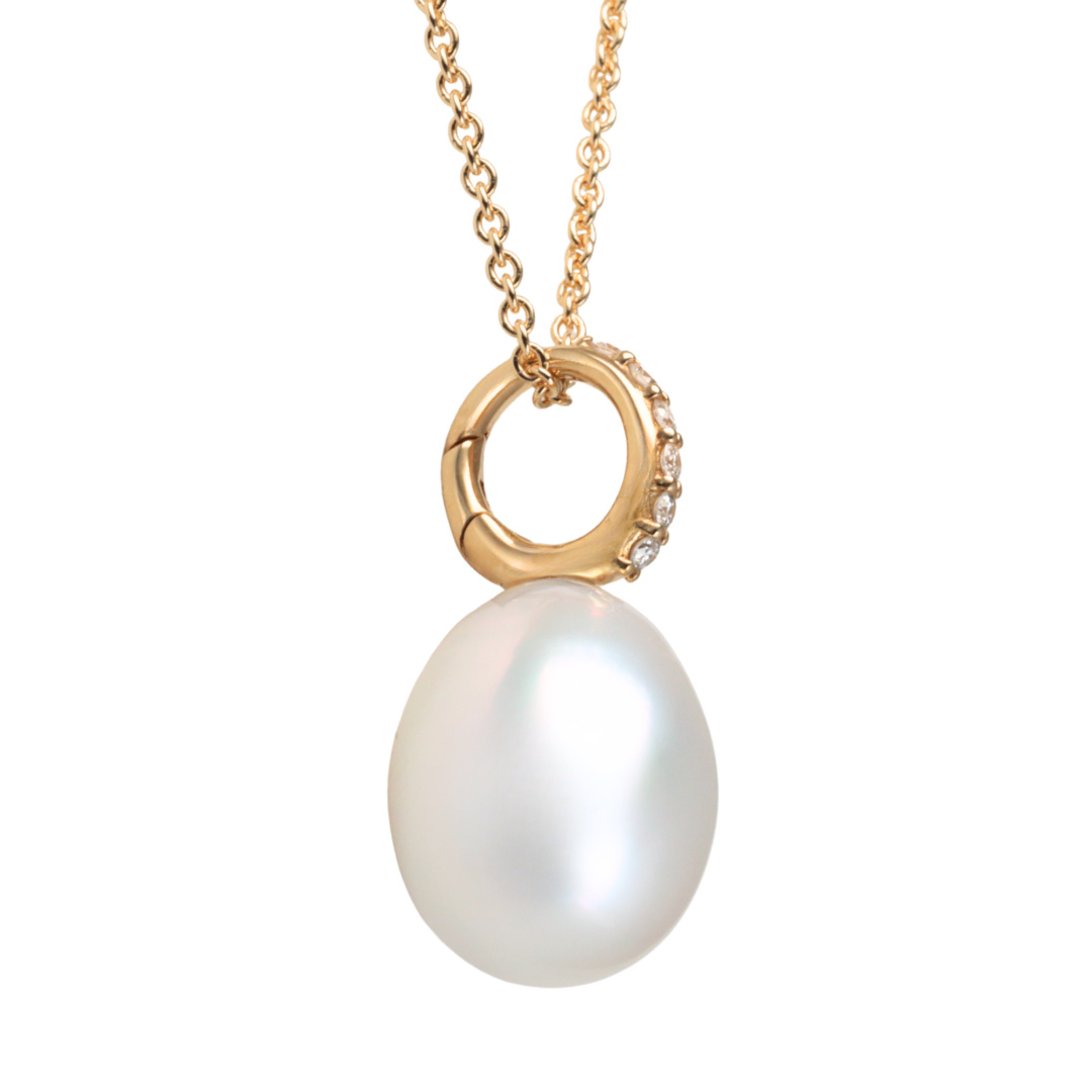 Side view of a south sea peal and diamond   pendant, set in yellow gold, Zappacosta Jewels 