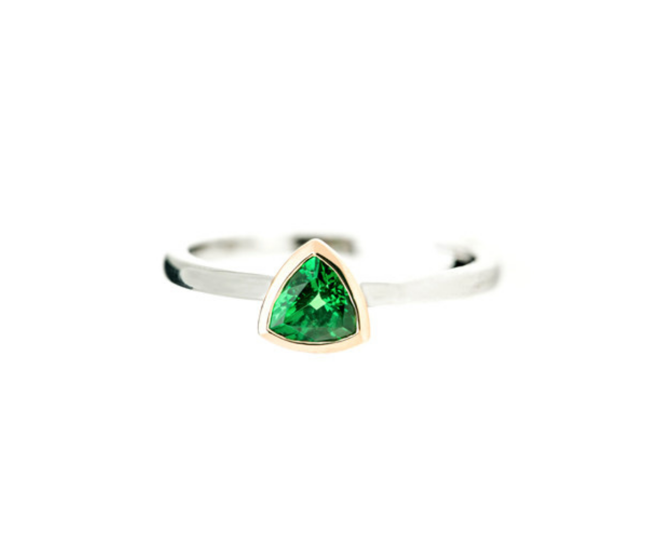 Ring with a green gemstone on a white background